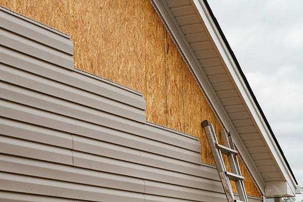Professional Siding Replacement technician working in Greenville, PA